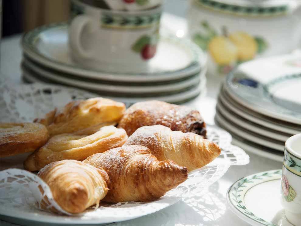 Croissant served on a plate for breakfast at the Hotel Limmerhof
